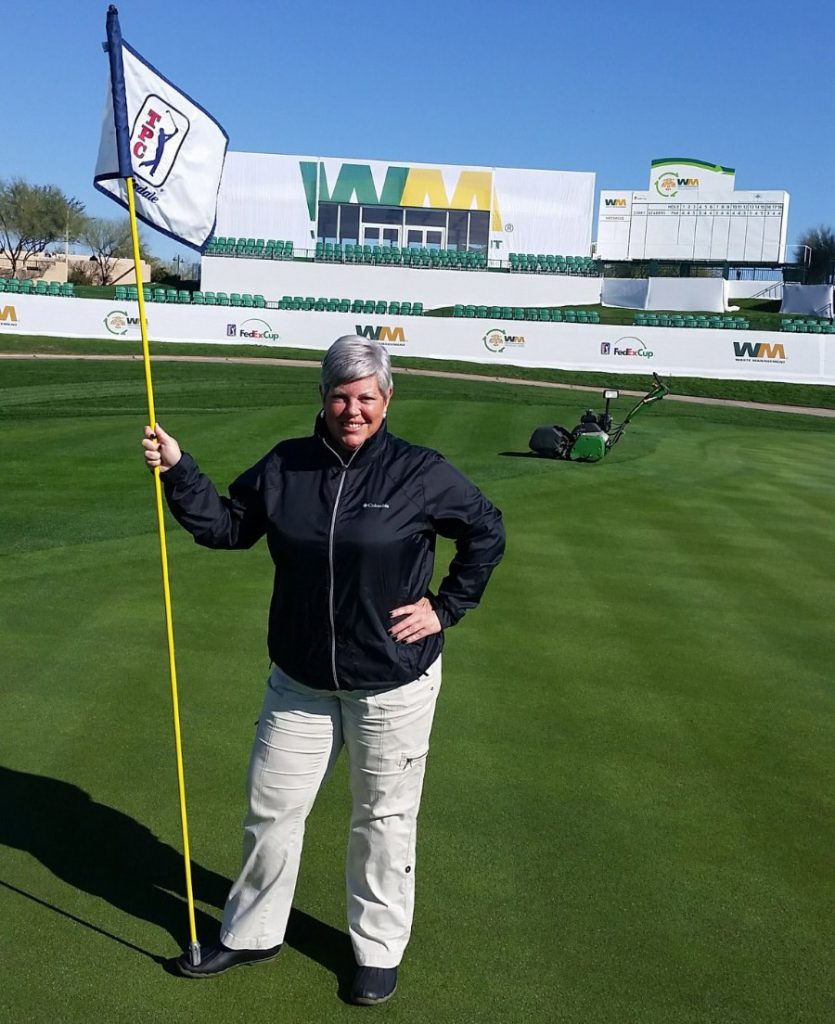 Jennifer Seevers, Endurant turf colorant division manager Geoponics, stands on liquid overseed applied at TPC Scottsdale Waste Management Phoenix Open