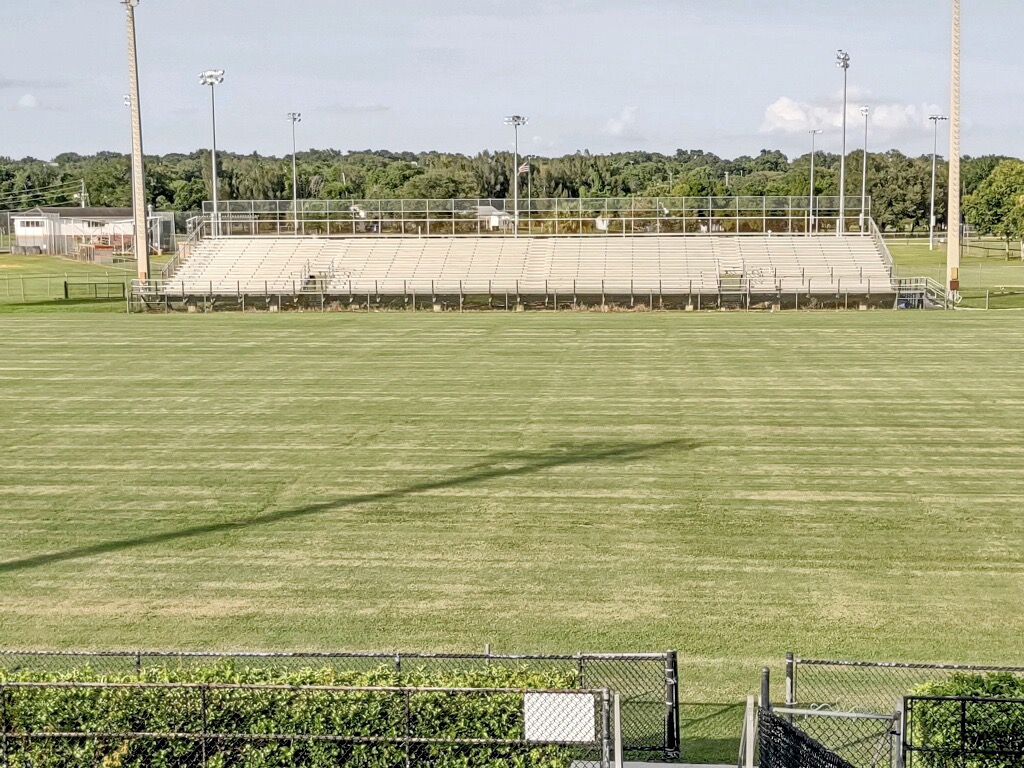 Before photo: Before Endurant Flex this Lake Wales football field was suffering from lack of water looking dry and patchy. 