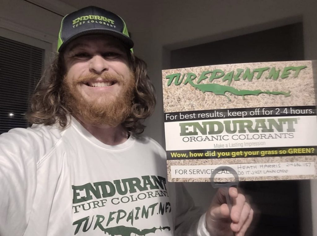Heath Harris of Do It Just Lawn Care with an Endurant Turf Paint yard sign that helped get his green grass paint business off the ground in Forney, Texas 20 miles from Dallas